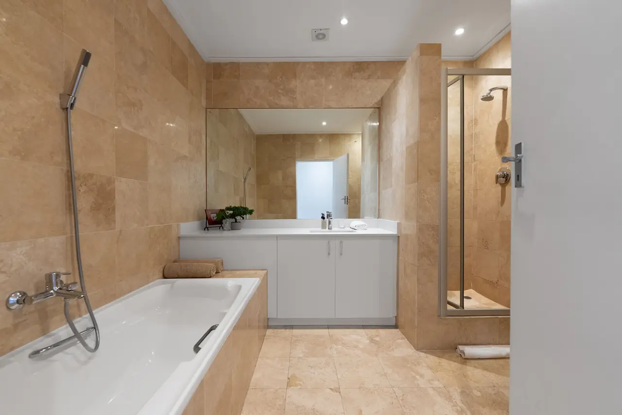 Upstairs bathroom with bath, vanity and separate shower