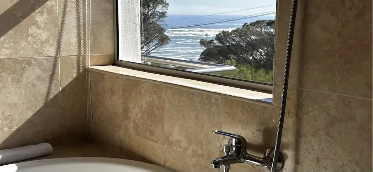 Sea view over Camps Bay from the en suite bath
